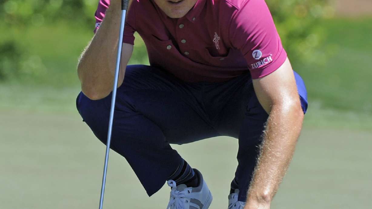 Holmes takes 1-shot lead at Quail Hollow