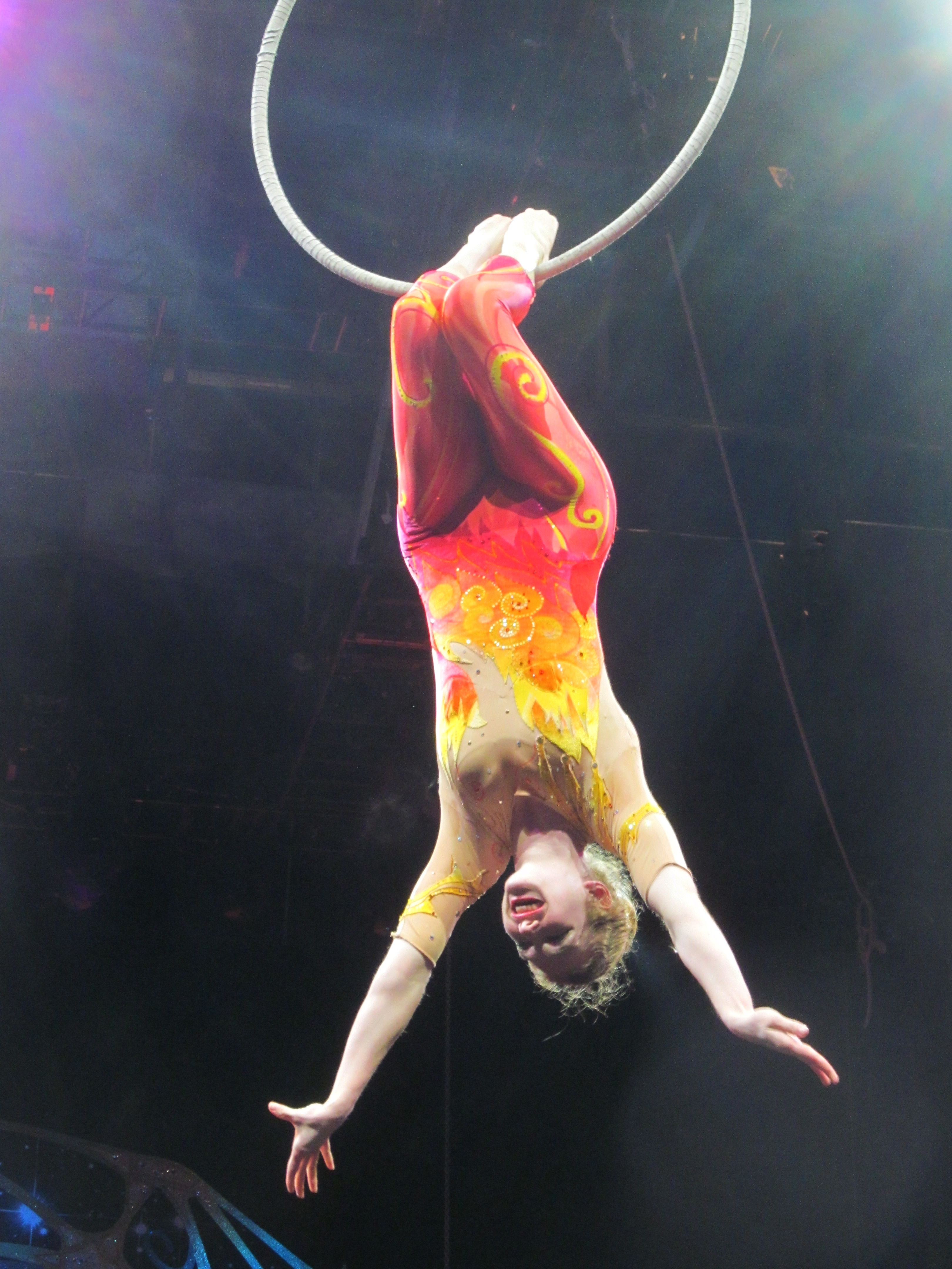 Circus acrobat willing to do hair-hanging again