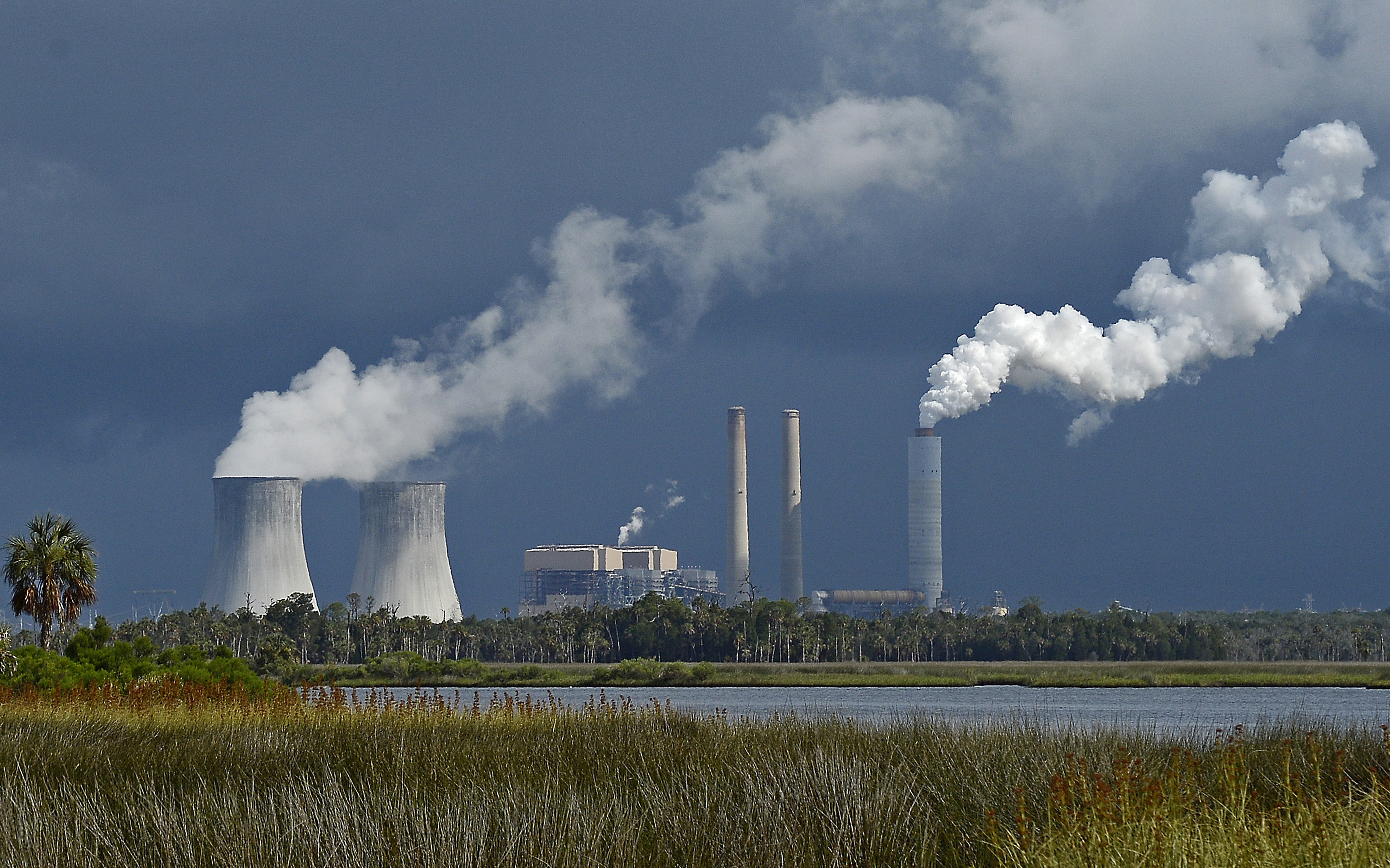 Duke posts loss declining value of power plants