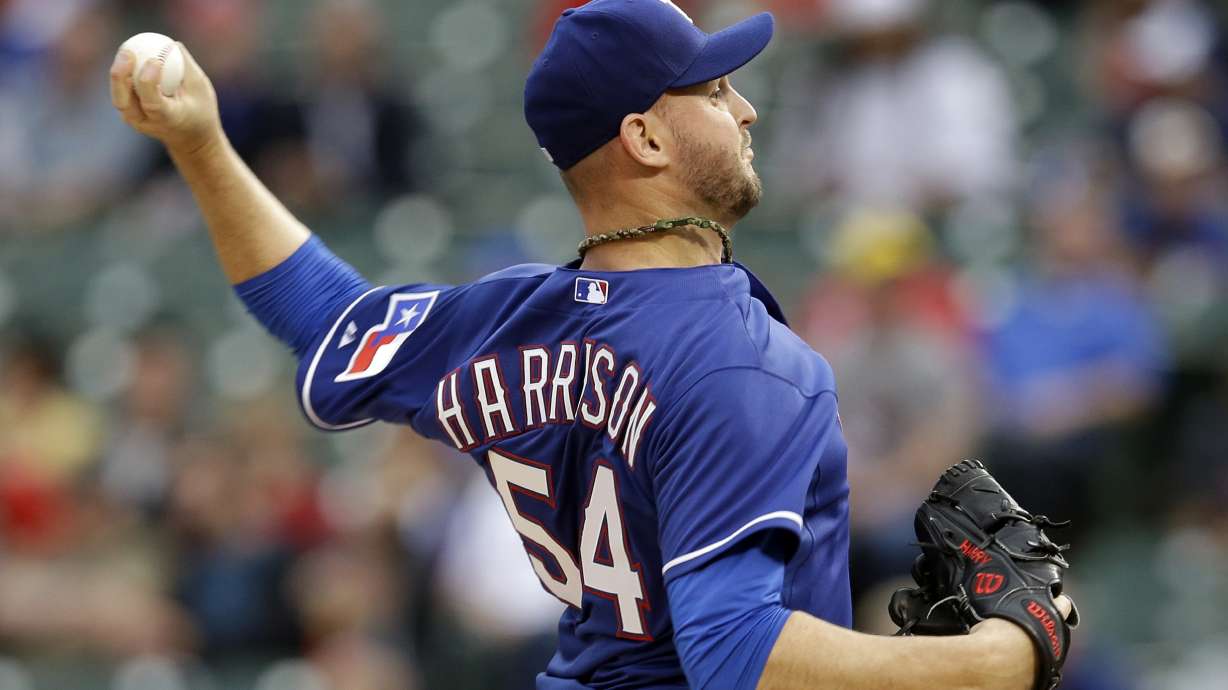 Rangers rebound for 5-0 win over Rockies