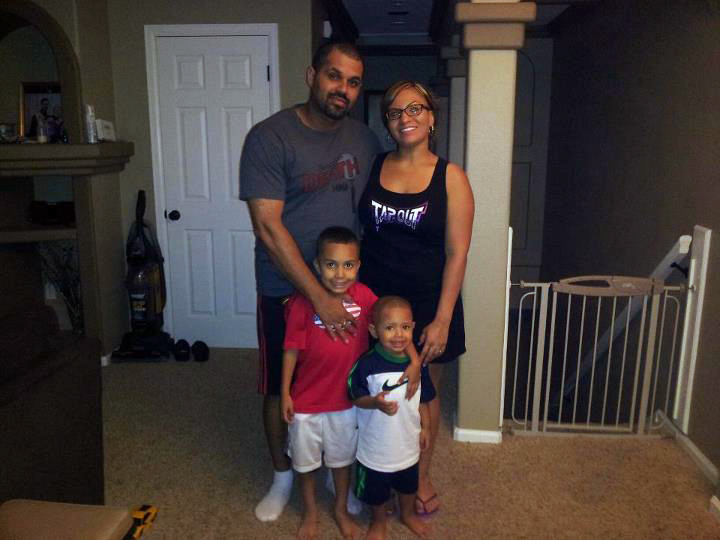 In this undated family photo provided by the
Lima-Marin Family, Rene Lima Marin stands
with his wife Jasmine and children Justus, 7,
and Josiah, 4, at their home in Aurora, Colo.
Rene Lima-Marin was sentenced in 2000 for a
conviction in a robbery, kidnapping and
burglary after robbing two Aurora video
stores when Marin was 18. Marin was to stay
in prison the rest of his life and serve 98
years. He was released after just 8 years due
to a clerical error, living a crime-free life
for six years before being sent back after
authorities discovered their mistake.