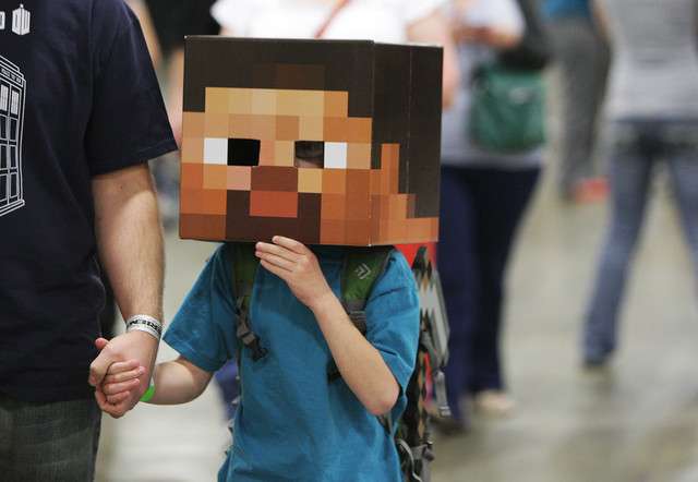 A young attendee walks through Comic Con at the Salt Palace in Salt Lake City Thursday, April 17, 2014.