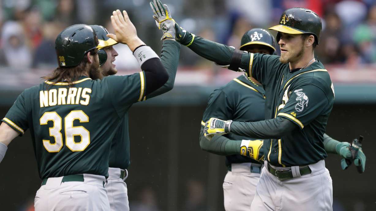 Reddick has 2 HRs, 6 RBIs as A's beat Indians 11-1