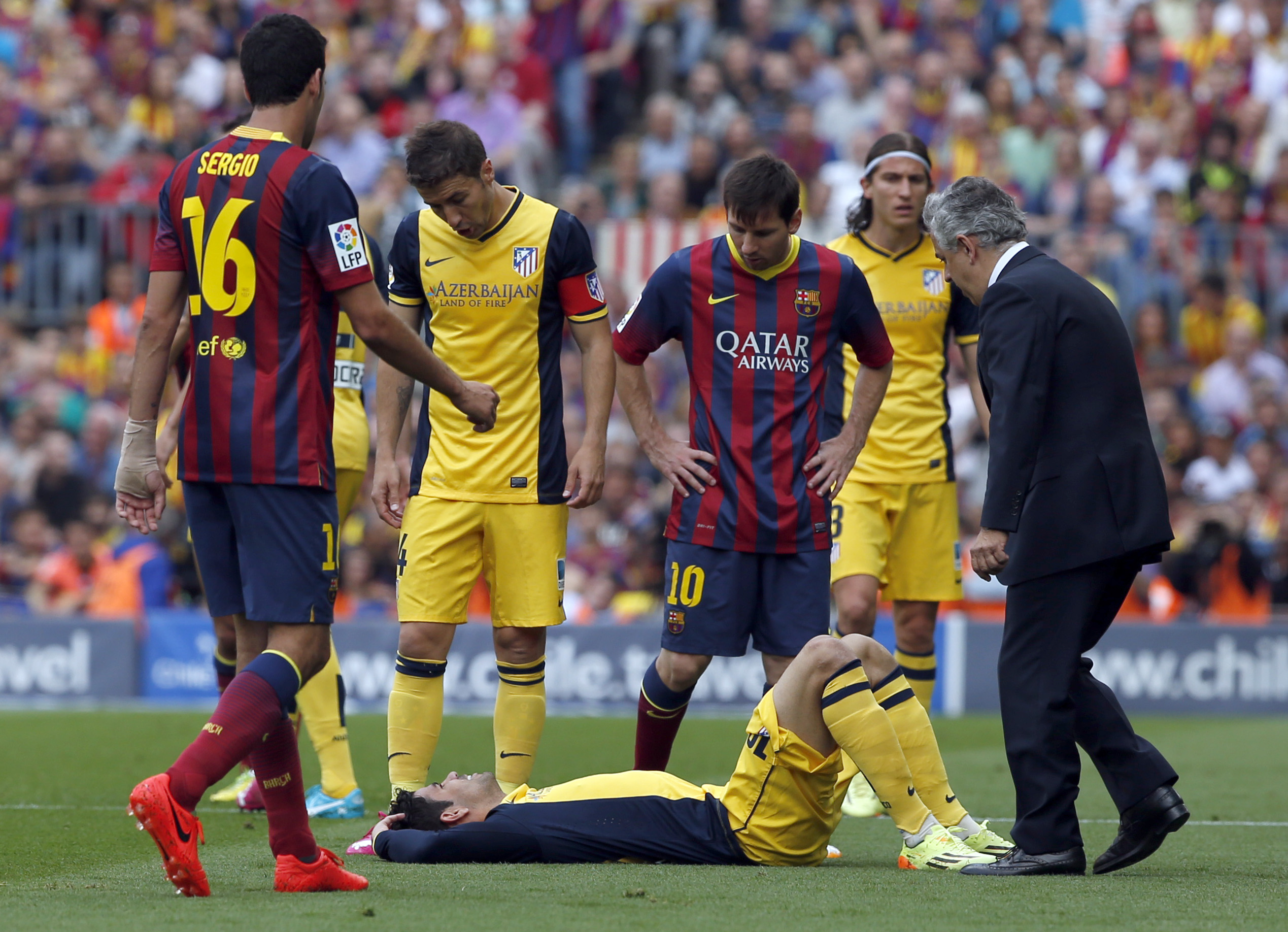 Atletico wins Spanish title with 1-1 tie at Barca