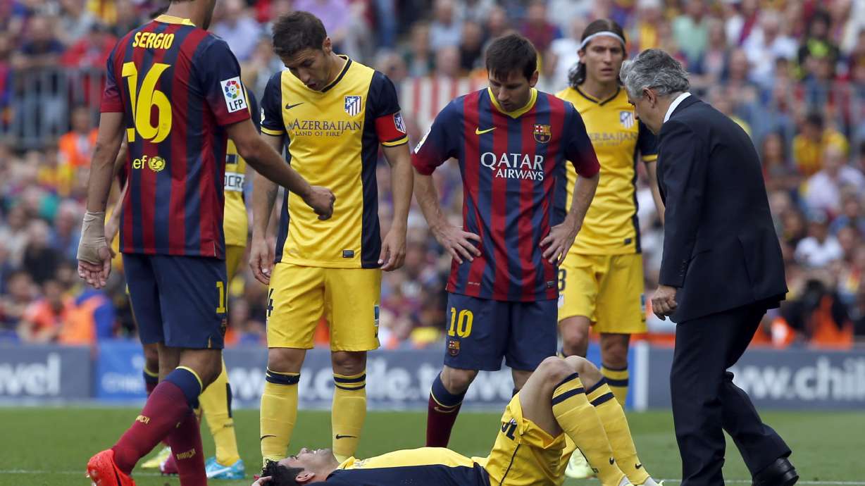Atletico wins Spanish title with 1-1 tie at Barca
