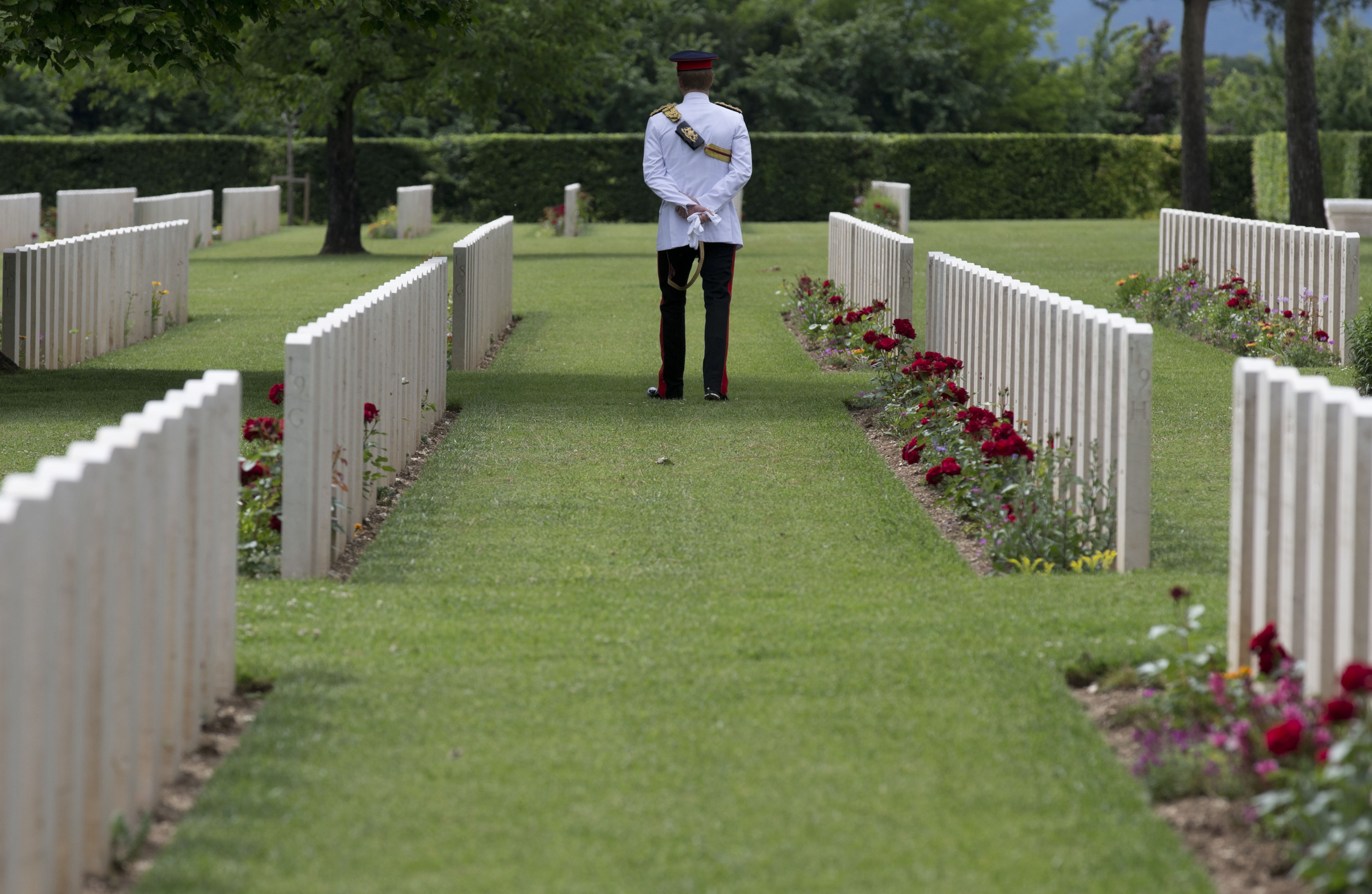 Prince Harry in Italy visits Colosseum, WWII site