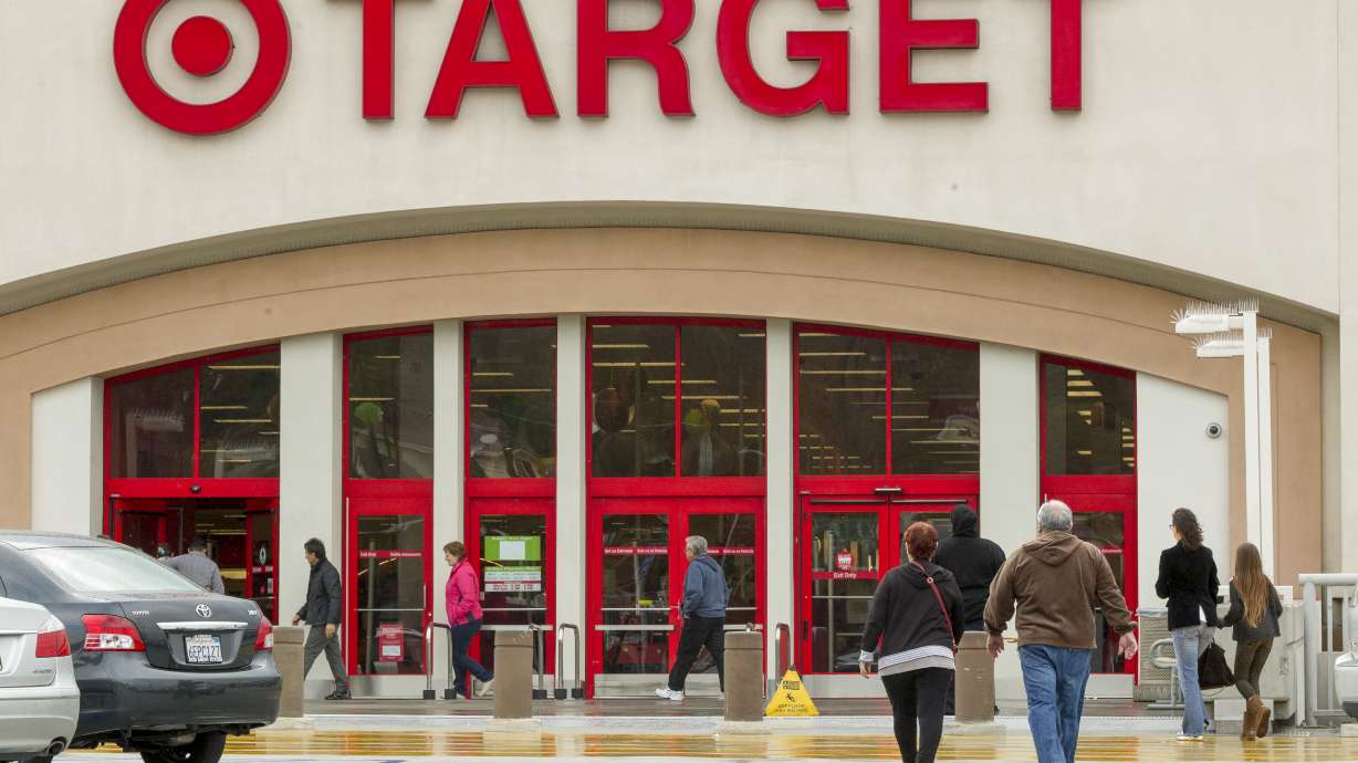 Target 1Q profit falls 16 pct as breach takes toll