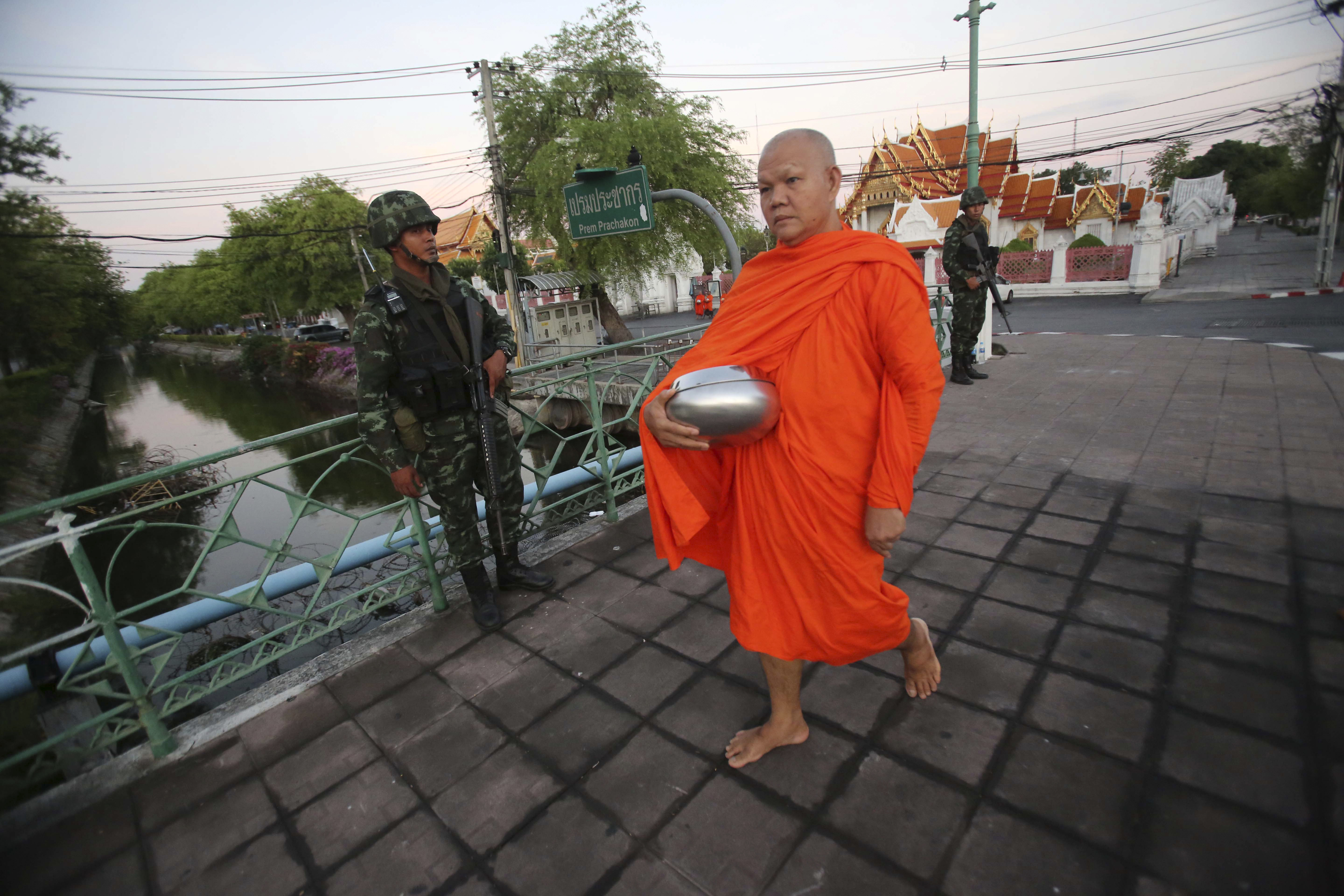 Thai army: Ex-PM, protest leaders held 'to think'
