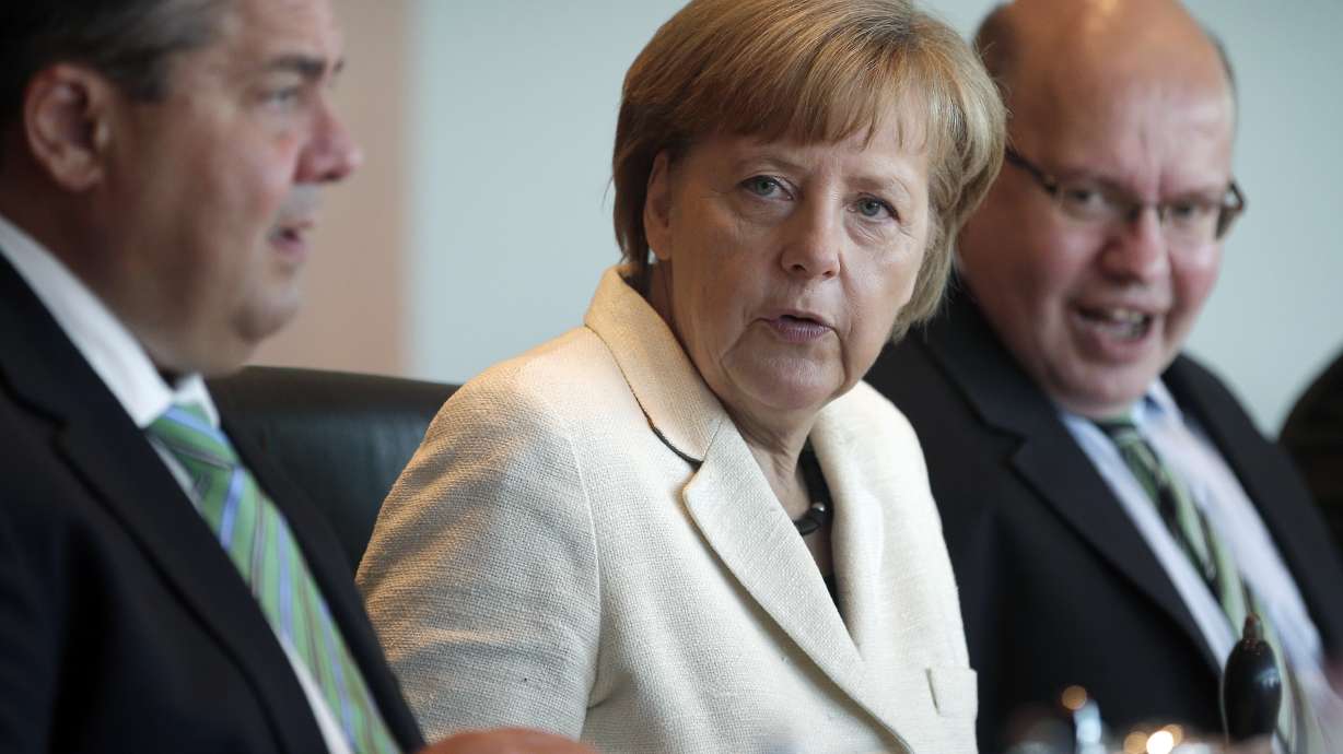 German business confidence slips back
