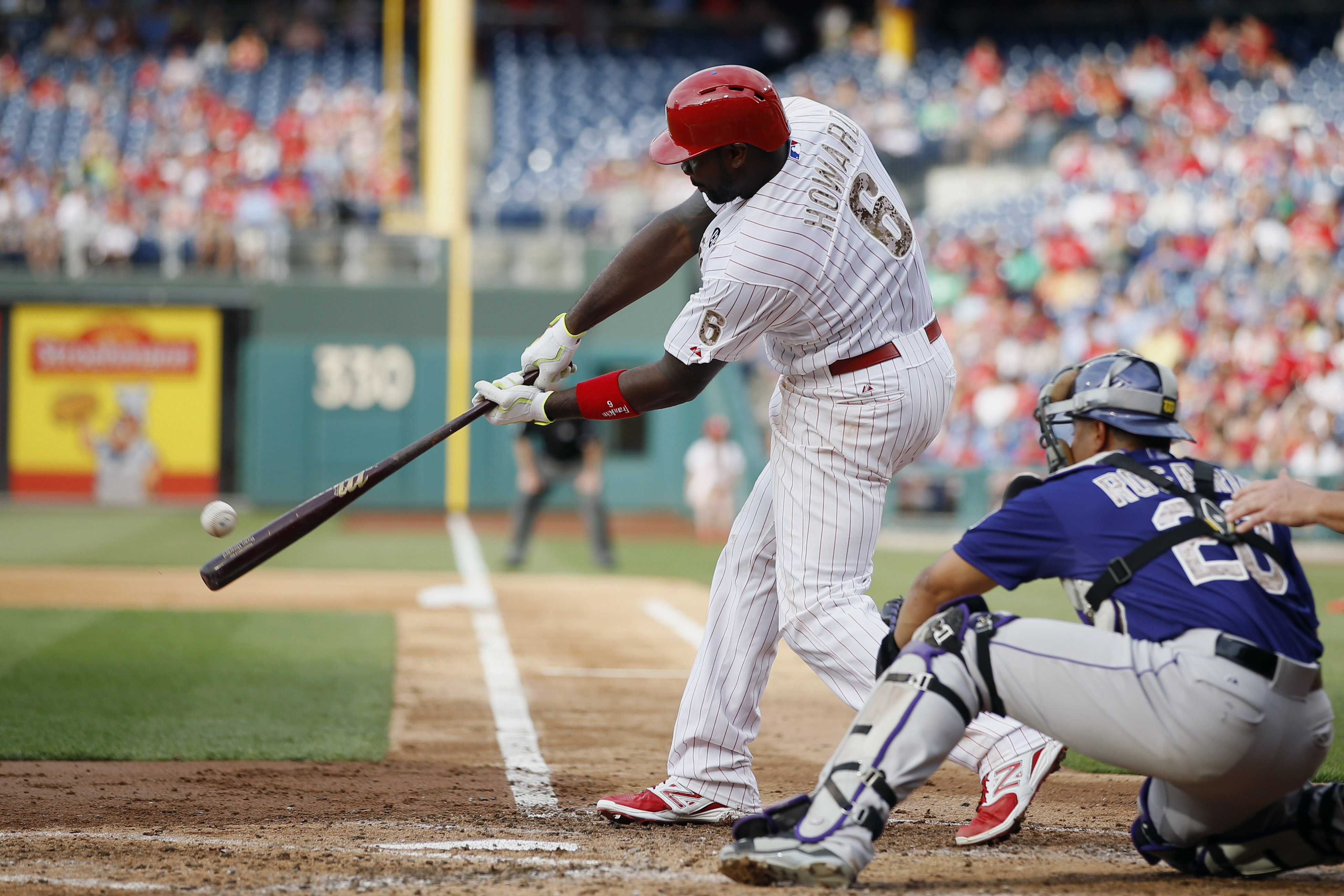 Howard, Kendrick lead Phillies over Rockies 9-0