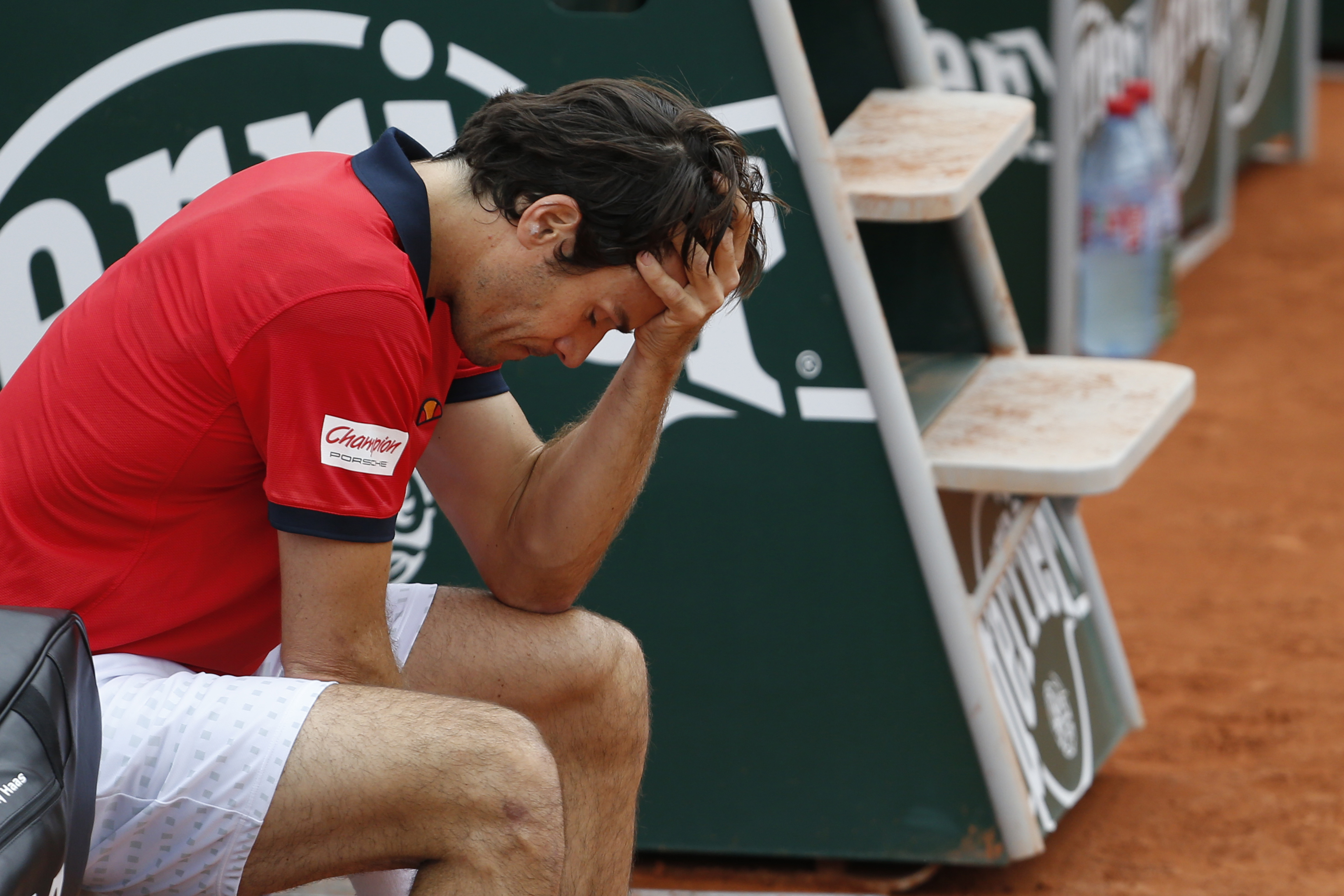 Haas, 36, out with injury in 1st set at French