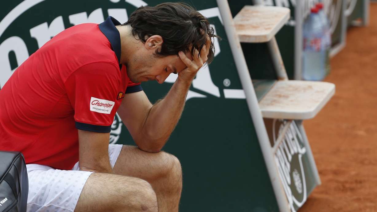 Haas, 36, out with injury in 1st set at French