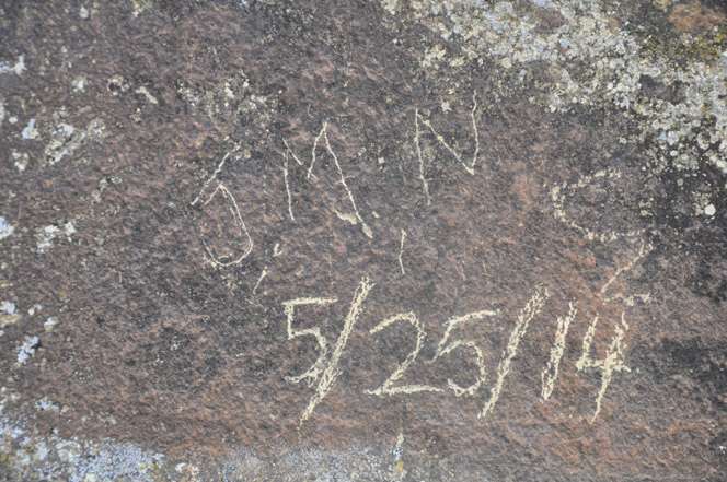 This vandalism of valuable rock art in Nine Mile Canyon happened May
25 and has prompted a federal criminal investigation. The defacing
involves the "Pregnant Buffalo" site visited by thousands of people
every year. (Photo: Jerry Spangler, Colorado Plateau Archaeological
Alliance)