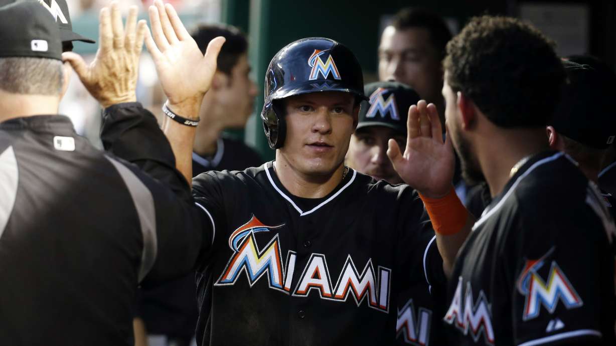 Four-run 10th lifts Marlins over Nationals 8-5