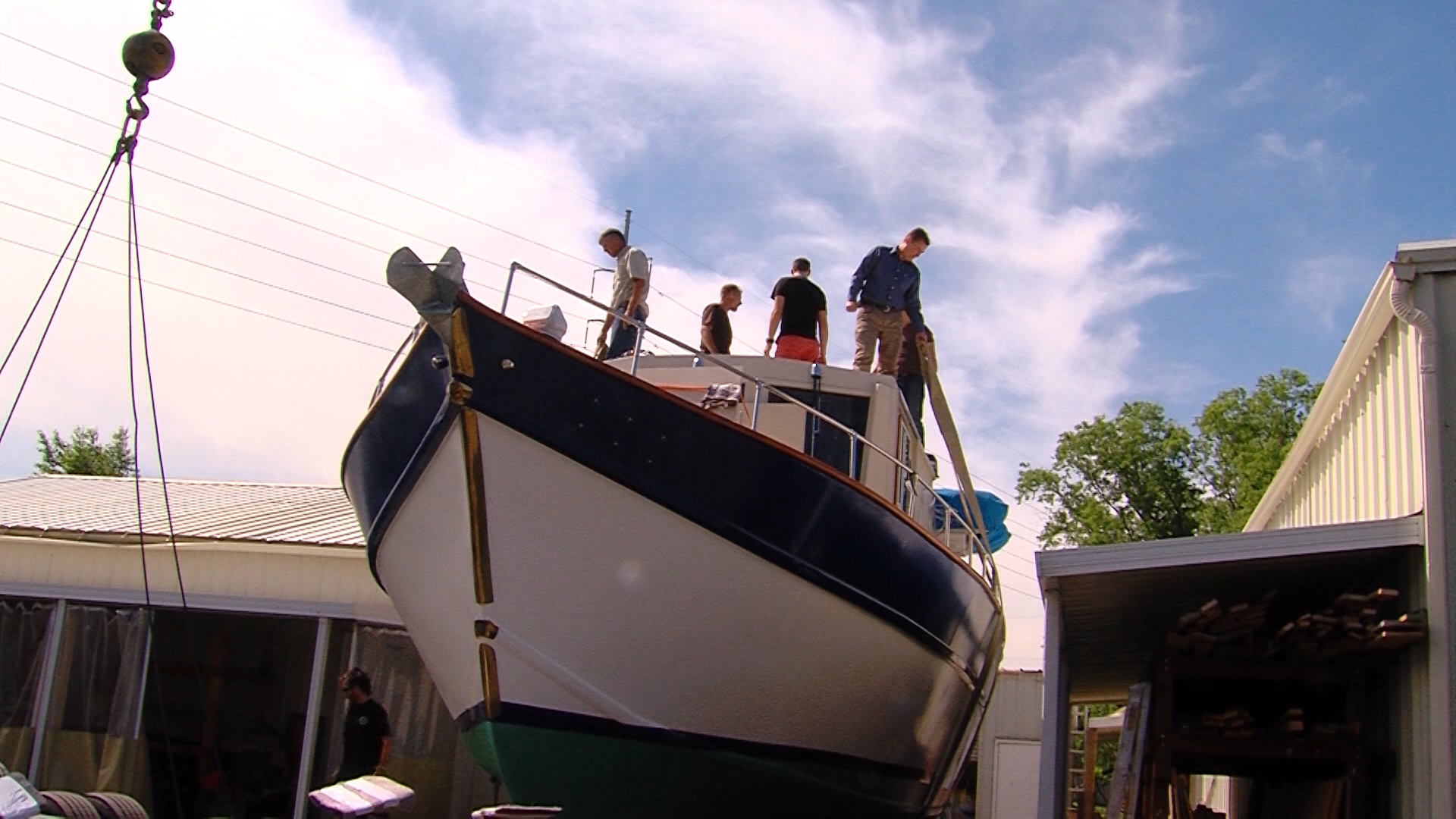 Mike Stock's boat, "Lovely Luz," prepares for transportation to Florida.