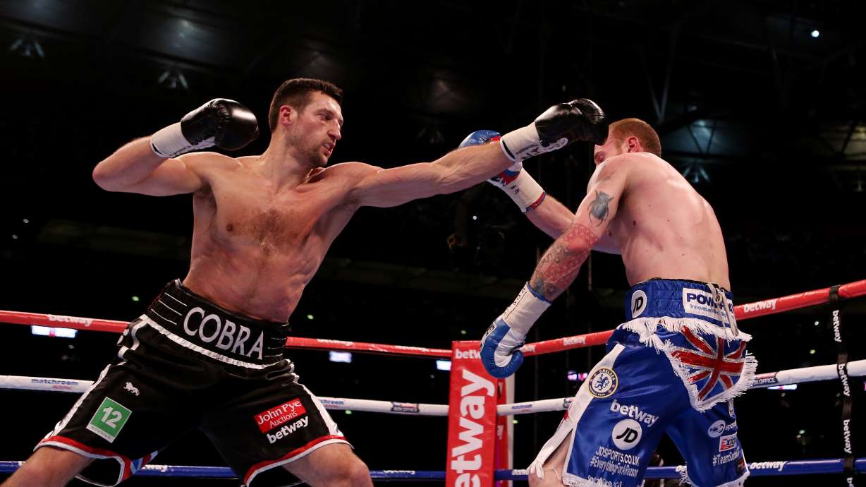 Froch beats Groves, retains WBA, IBF titles
