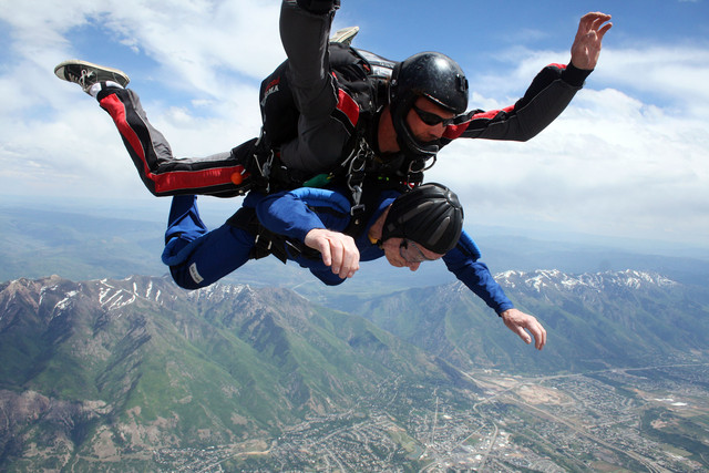 Richard Farr, 90, and tandem instructor Keegan Colton during their 
free fall Saturday, May 31, 2014 as they jump with Dive Ogden.