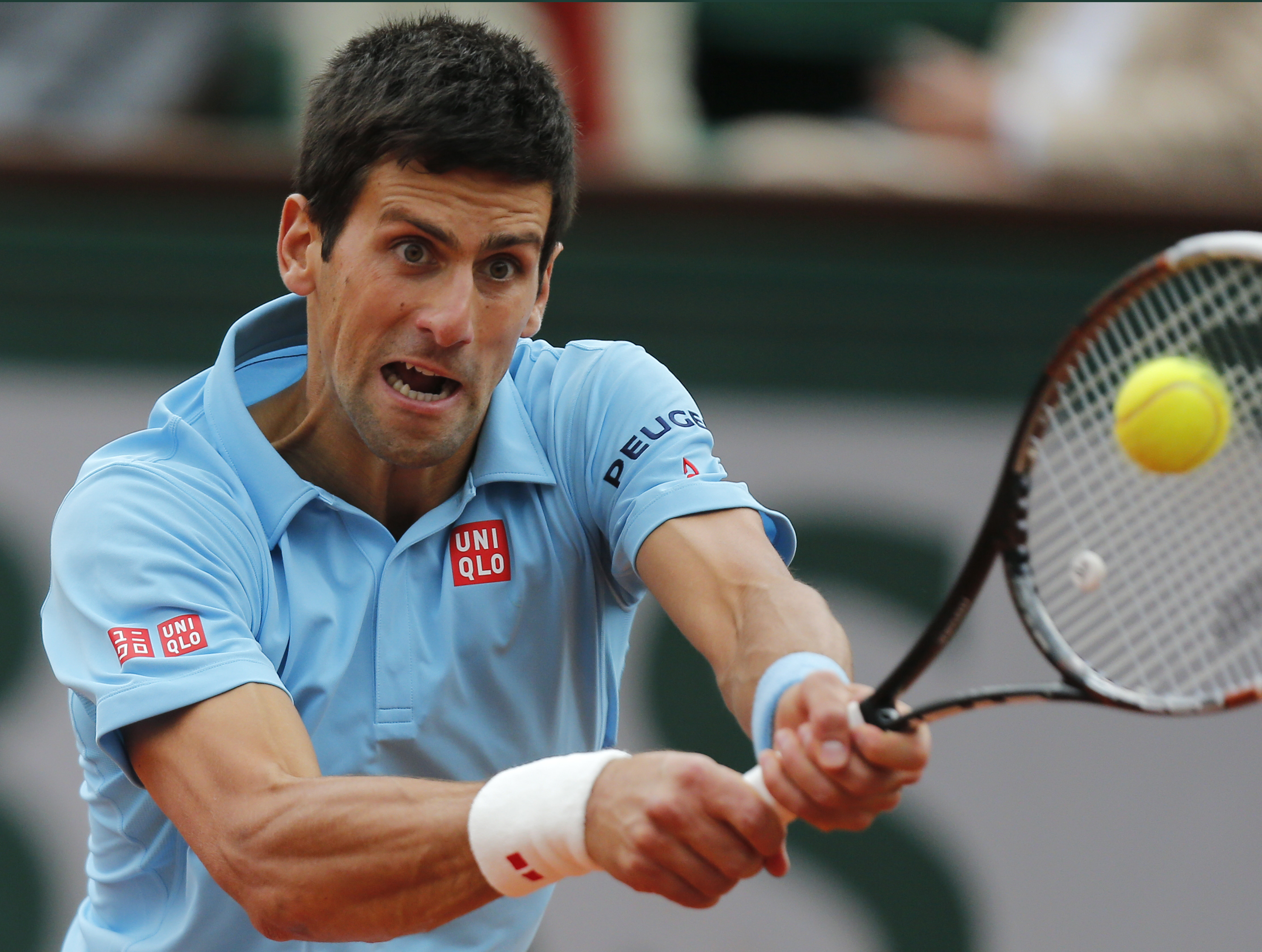 Djokovic easily beats Tsonga to reach French QFs