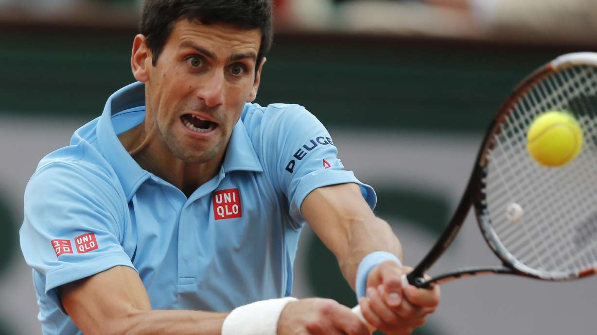 Djokovic easily beats Tsonga to reach French QFs