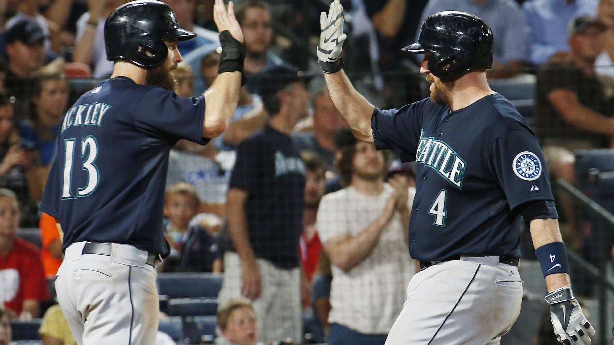 Buck's 2-run HR powers Seattle past Atlanta 7-5