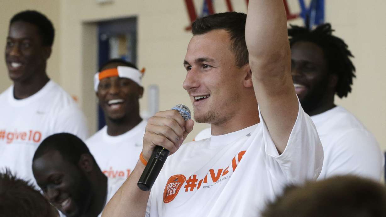 Johnny Football's first pitch rained out