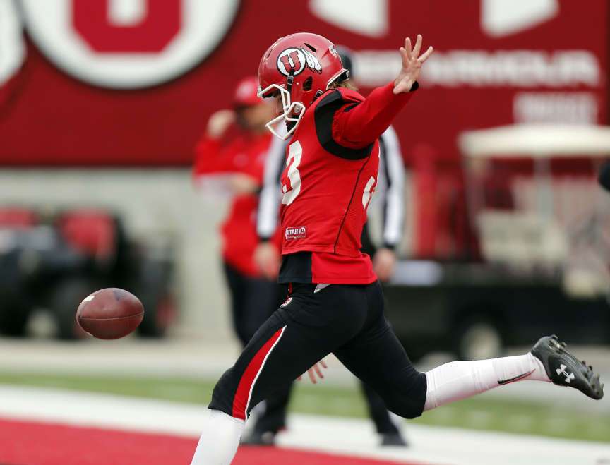 Tom Hackett punts the ball during a University of Utah Football
scrimmage in Salt Lake City, Friday, April 4, 2014.