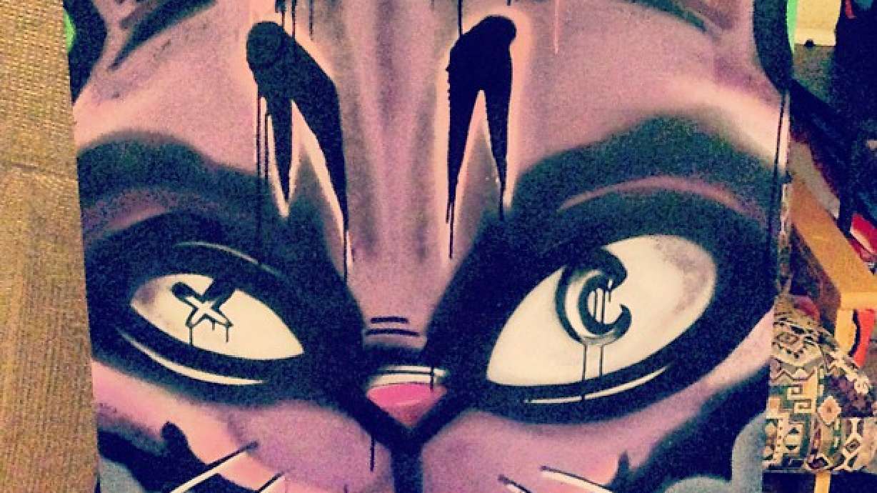 Artists give away paintings on SLC streets