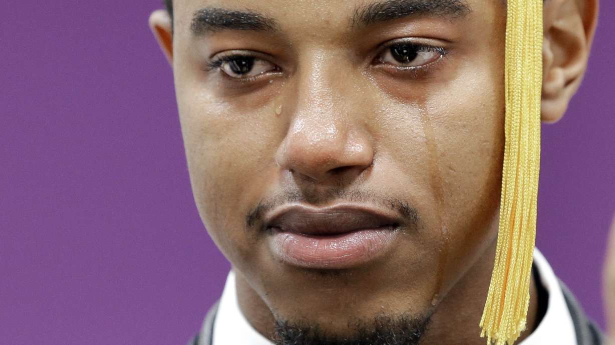 Inner-city school applauds first college graduates