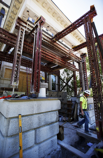 Crews repair a porch on the Governor's Mansion in Salt Lake City, Thursday, June 5, 2014. At right is Coltin Sharpe of W. W. Construction (Photo: Ravell Call, Deseret News)
