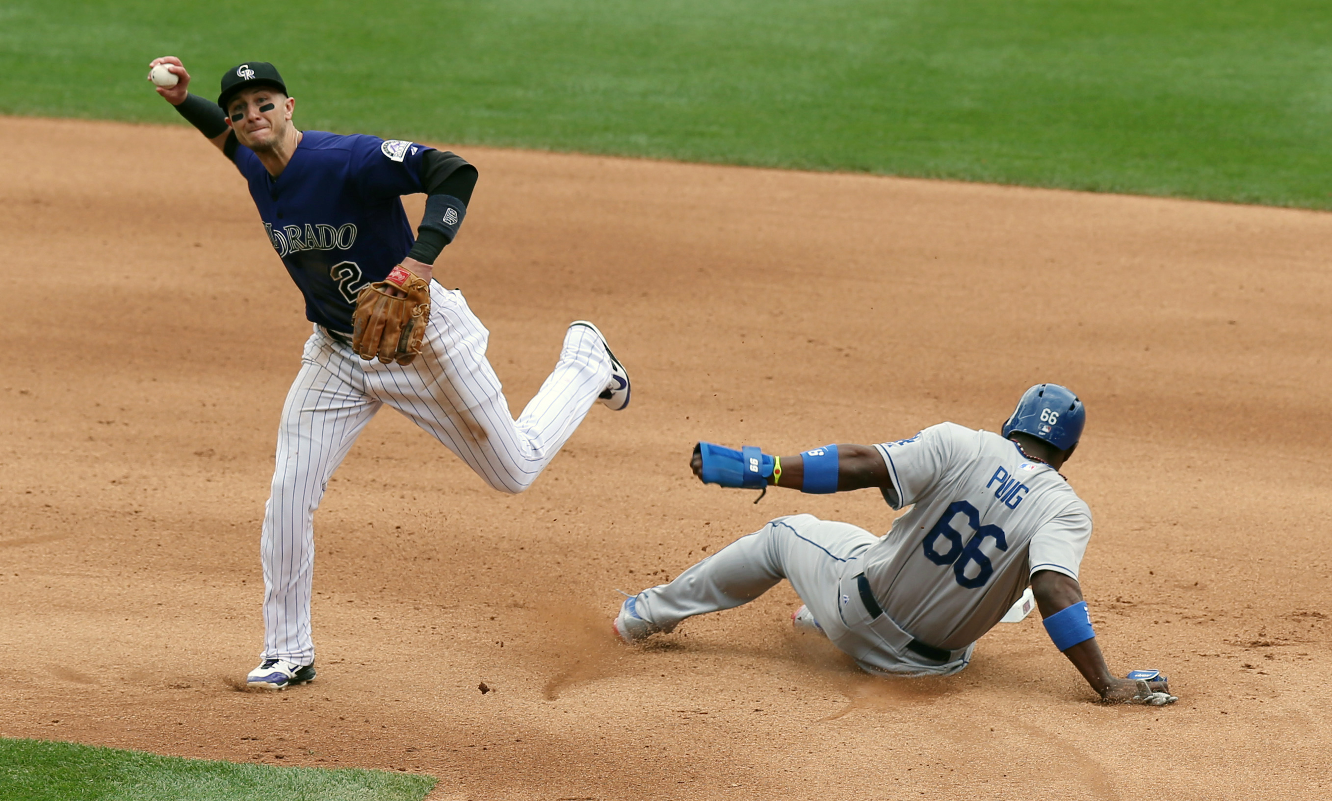 Dodgers lose Puig, Gordon, then lose to Rockies