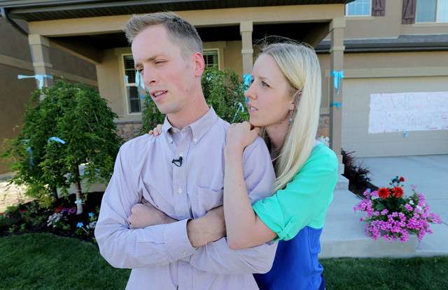 Sam Delahunty, a brother-in-law, and his wife,
Shauna, talk Monday, June 9, 2014, for the
Shelton family following the death of their 2-
year-old son, Kayson, in San Francisco. (Photo:
Scott G Winterton, Deseret News)