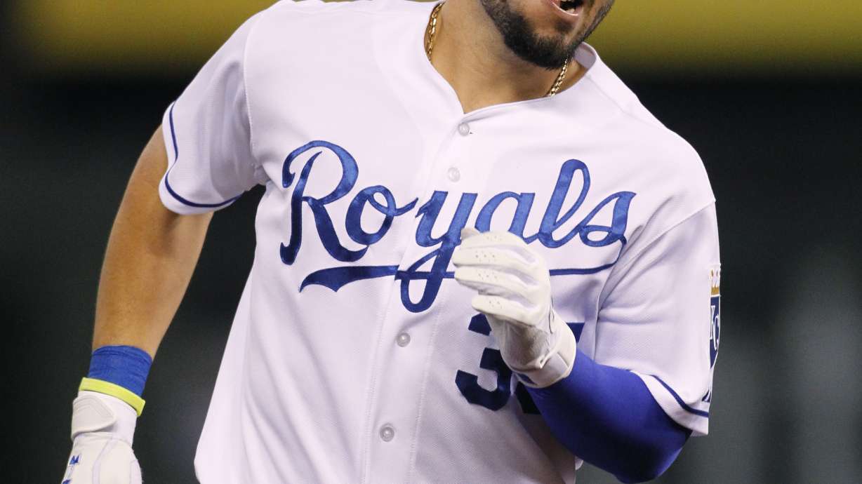 Royals hold on to beat hot-hitting Indians 9-5