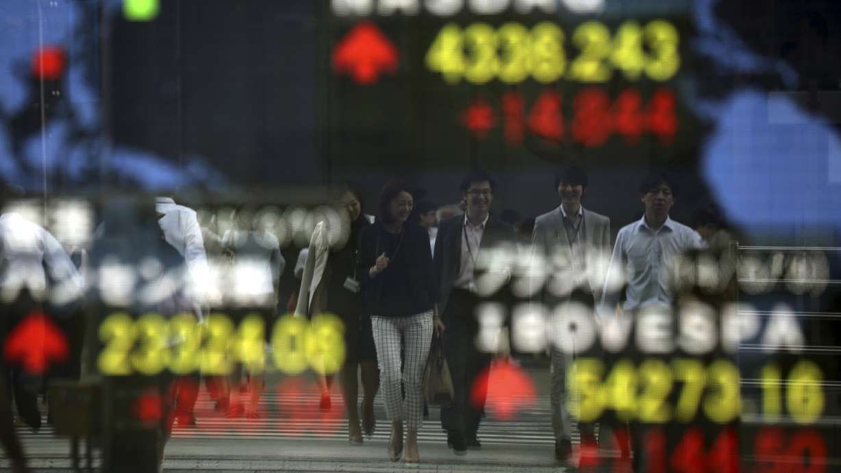 Stocks fall back as World Bank cuts growth outlook