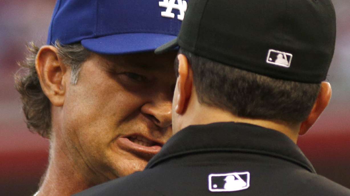 Kemp ejected, Dodgers fall to Reds 5-0