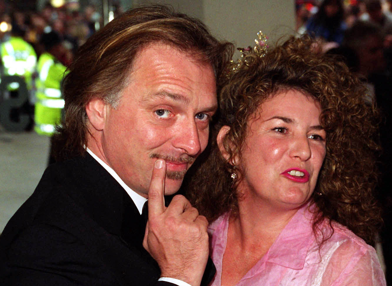 Wife says Rik Mayall suffered 'cardiac event'