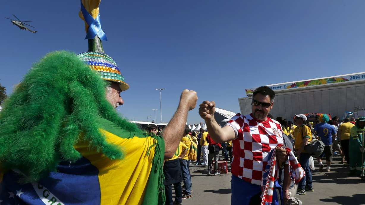 Croatian fans count on spirit as small in numbers