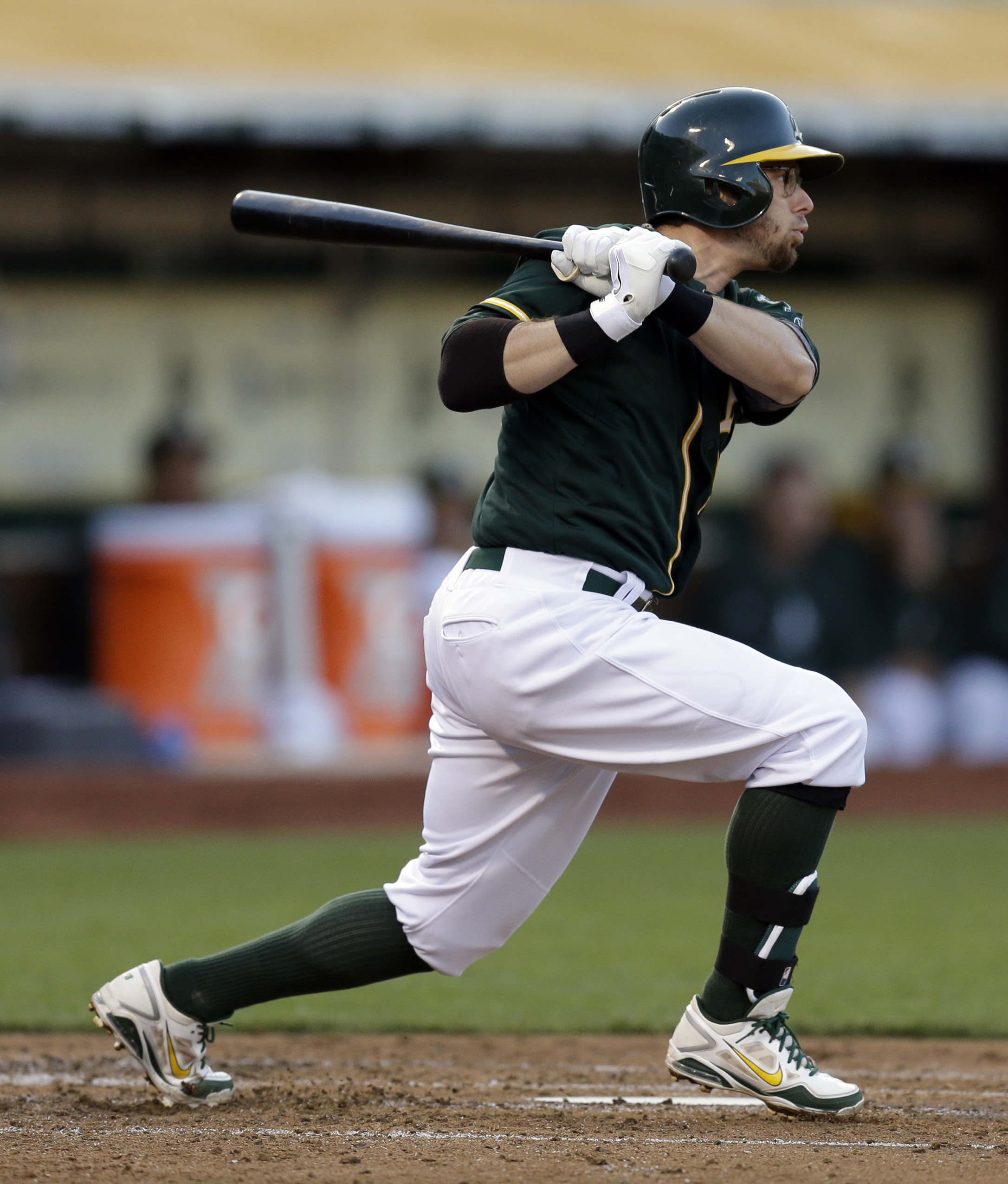A's beat Yankees 5-1 after light outage delay