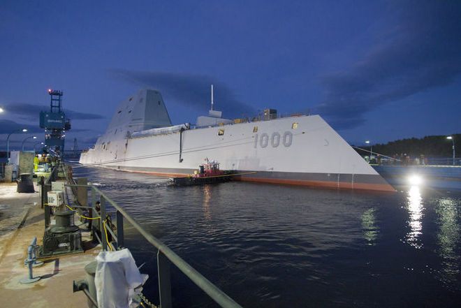 In this image provided by the U.S. Navy the Zumwalt-class guided-
missile destroyer DDG 1000 is floated out of dry dock at the General
Dynamics Bath Iron Works shipyard Oct. 28, 2013. The ship that bears
his name, the first of three Zumwalt-class destroyers, will be
christened by Zumwalt's two daughters on Saturday April 12, 2014 at
Bath Iron Works. Joining them will be his surviving son, who's a retired
Marine, and other relatives.