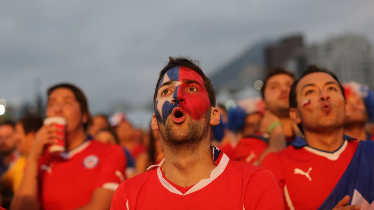 Spaniards stunned by 2-0 World Cup loss to Chile