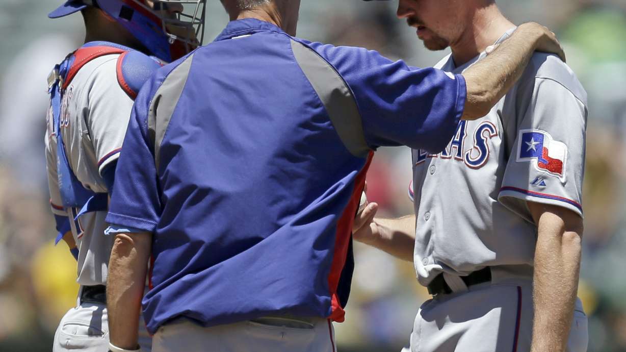 Rangers not worried about 9-game deficit to A's