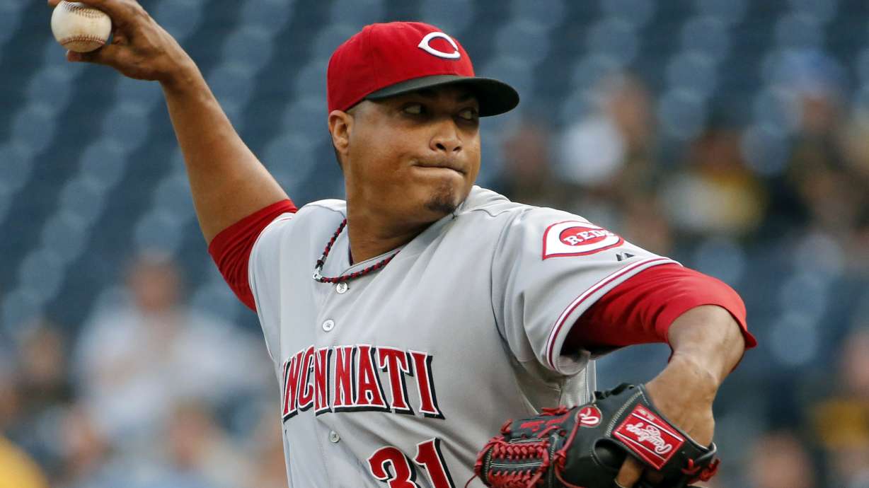 Simon wins 10th in Reds' 11-4 win over Pirates