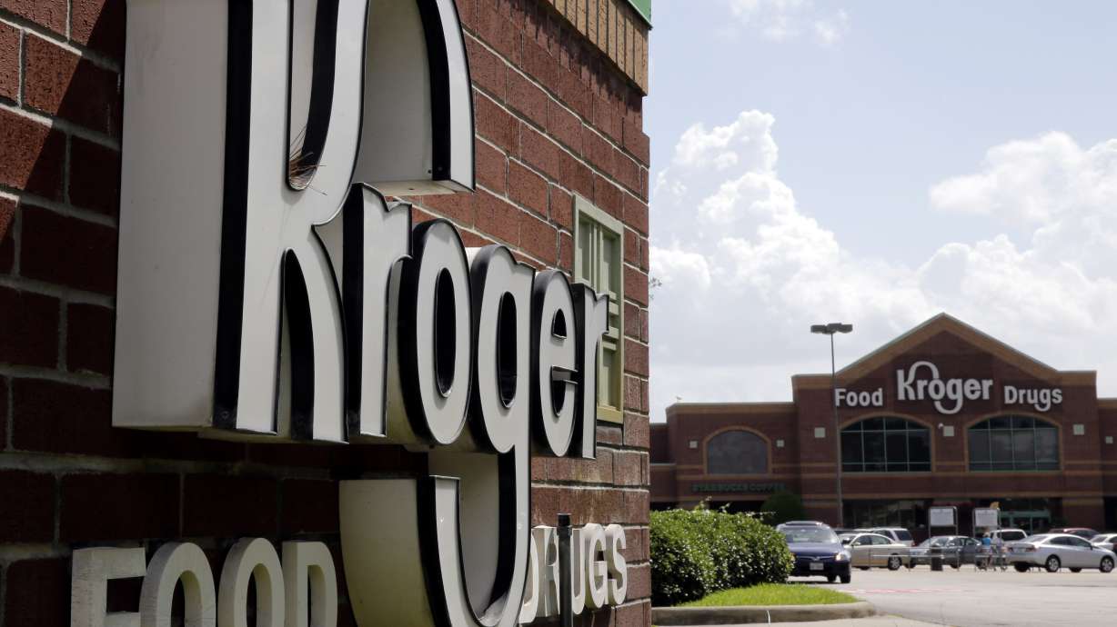 Kroger and Albertsons said Monday they will sell more of their stores in an effort to quell the federal government's concerns about their proposed merger.