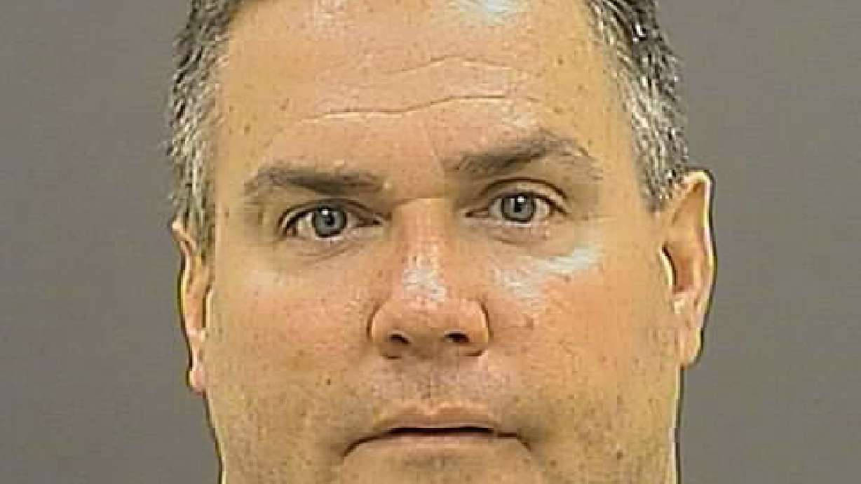 2nd officer suspended in slitting of dog's throat