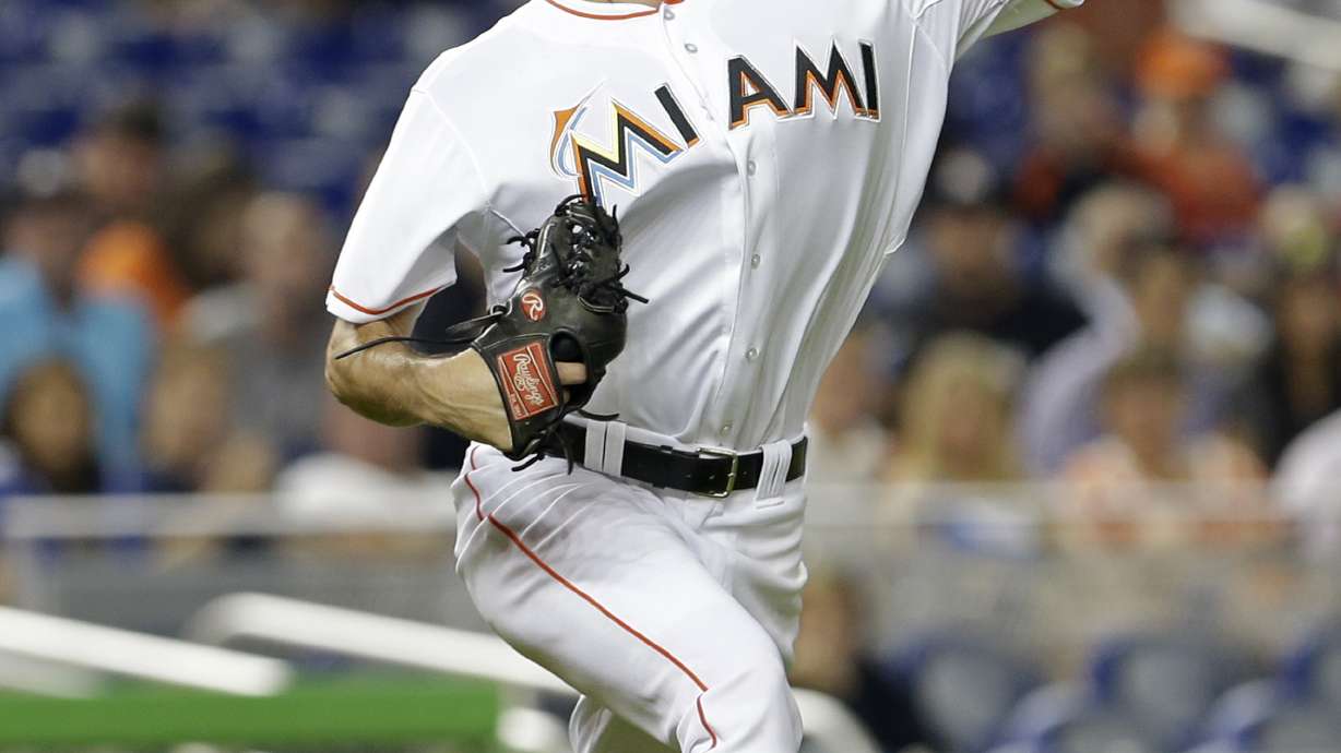 Miami's Heaney makes debut, loses to Mets' Wheeler