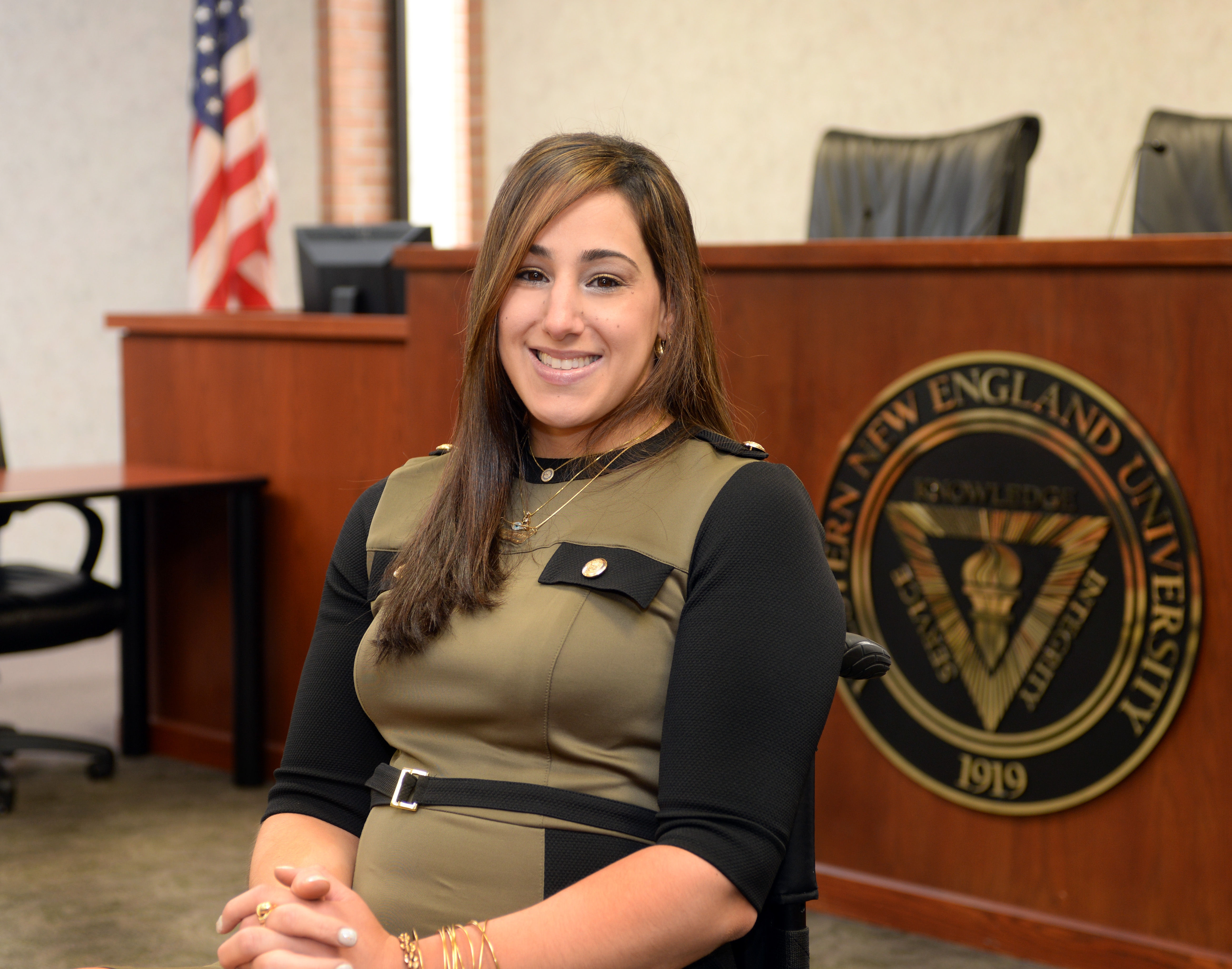 Mass. woman overcomes paralysis to earn law degree