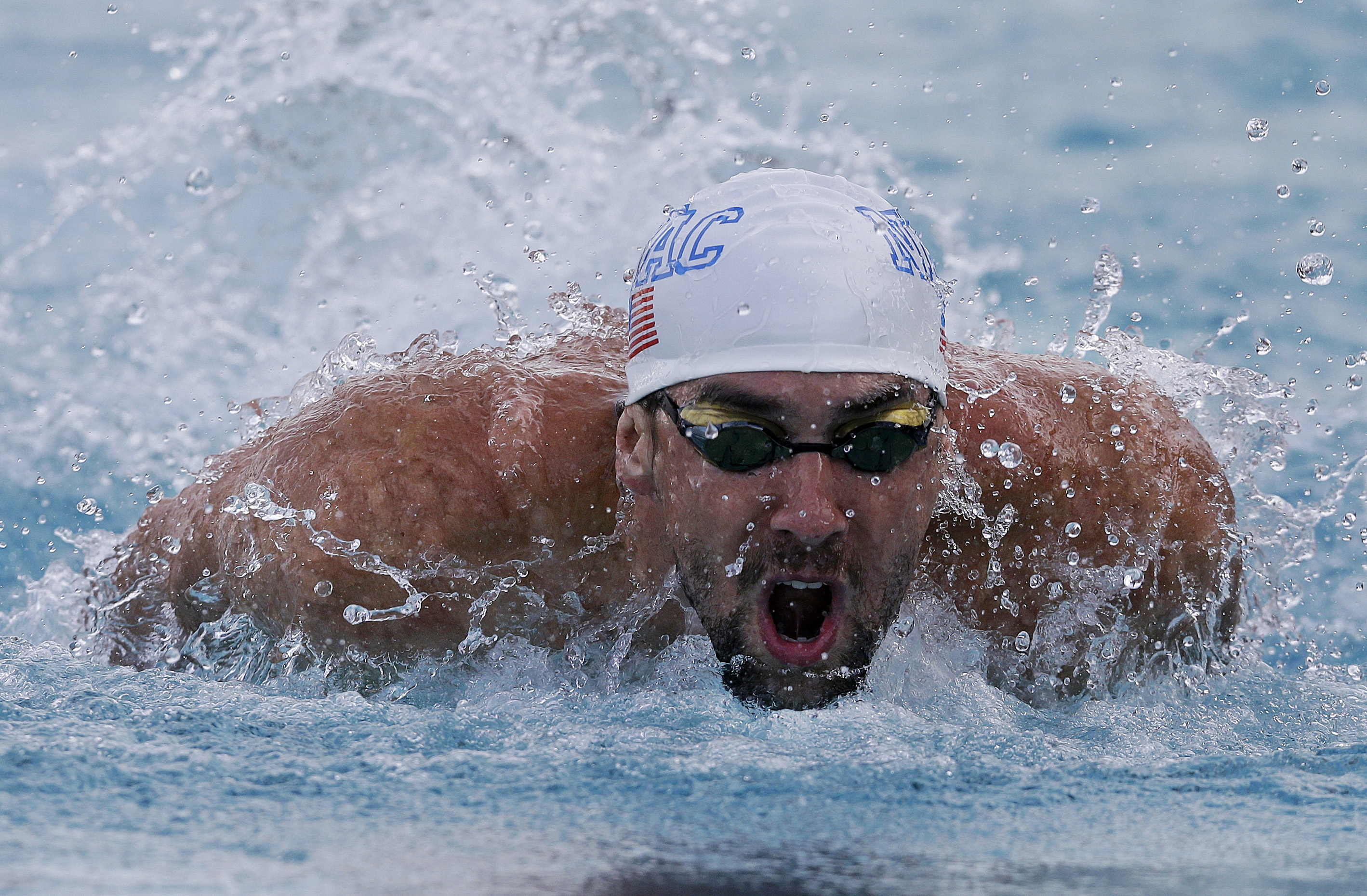 Michael Phelps shares 100 butterfly title