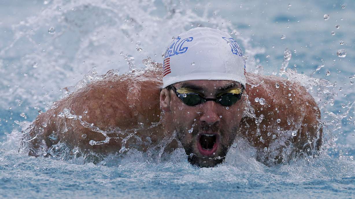 Michael Phelps shares 100 butterfly title