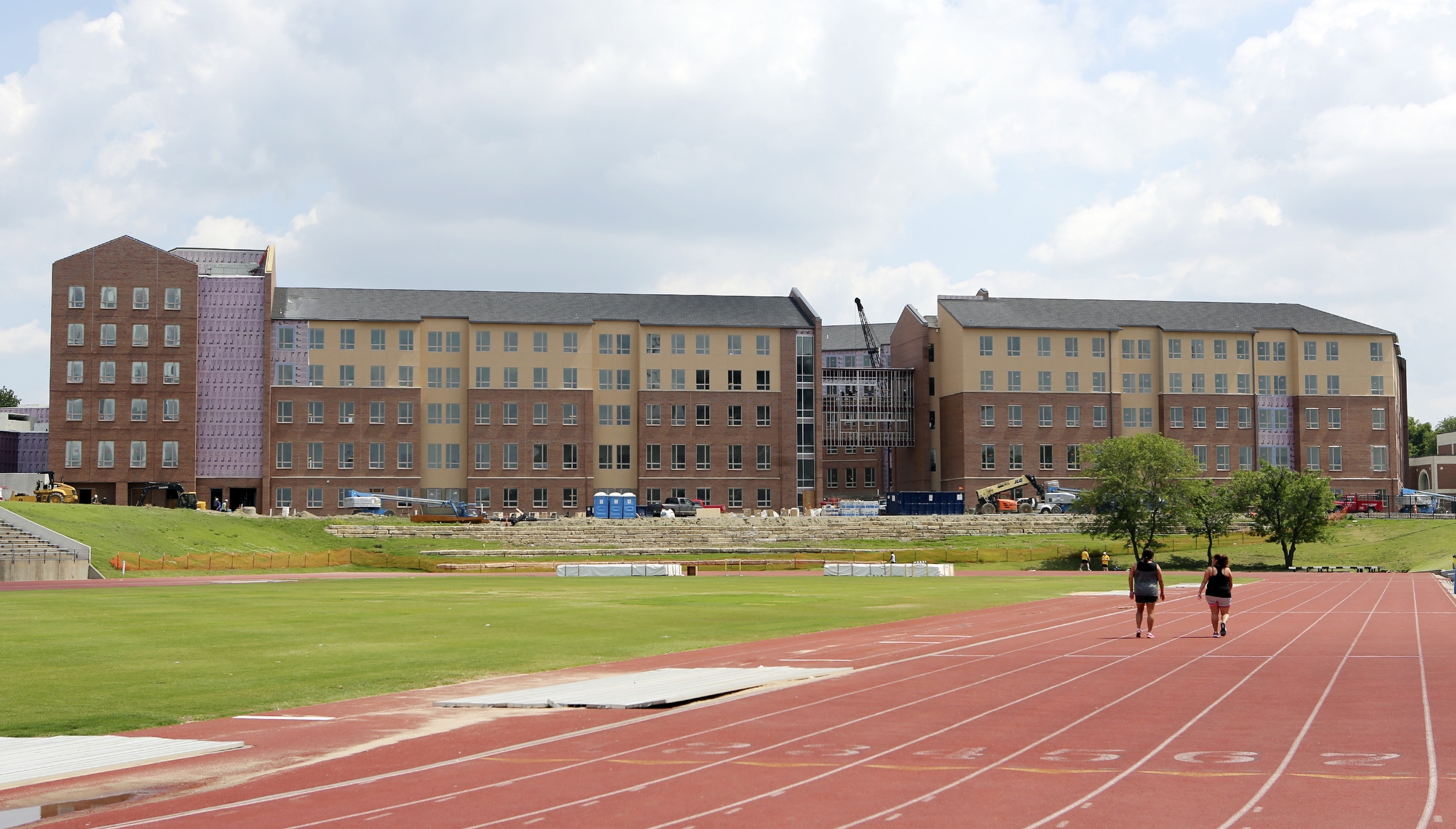Demand, aging buildings spur campus housing boom