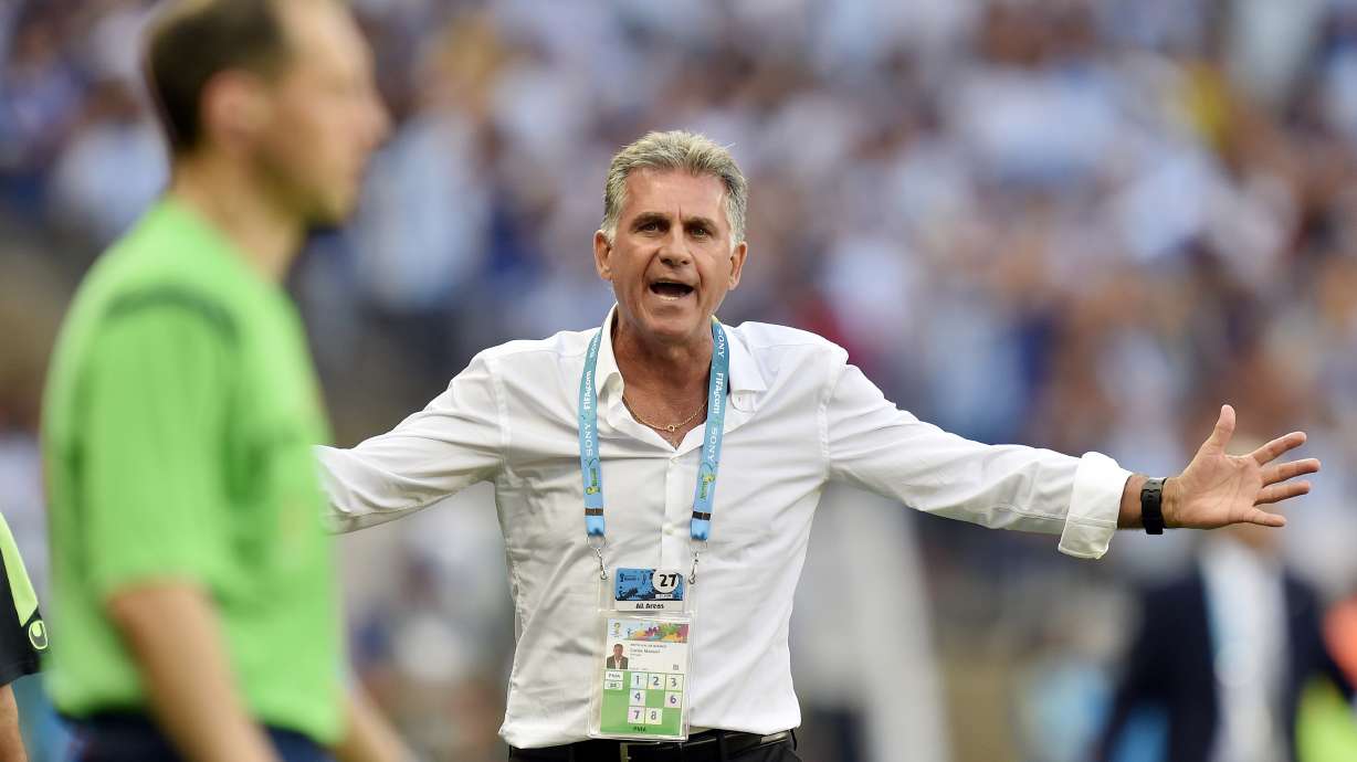 Iran coach blasts referee who waved away penalty
