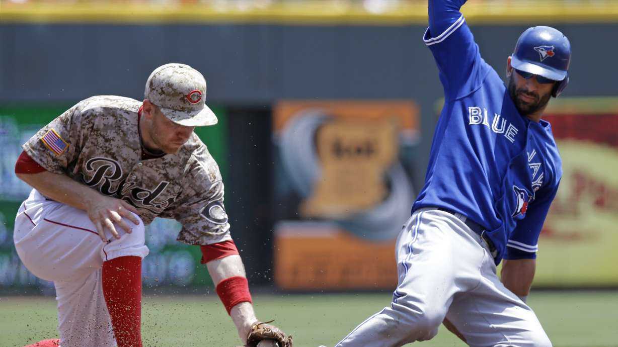 Bautista, Lawrie leave game against Reds